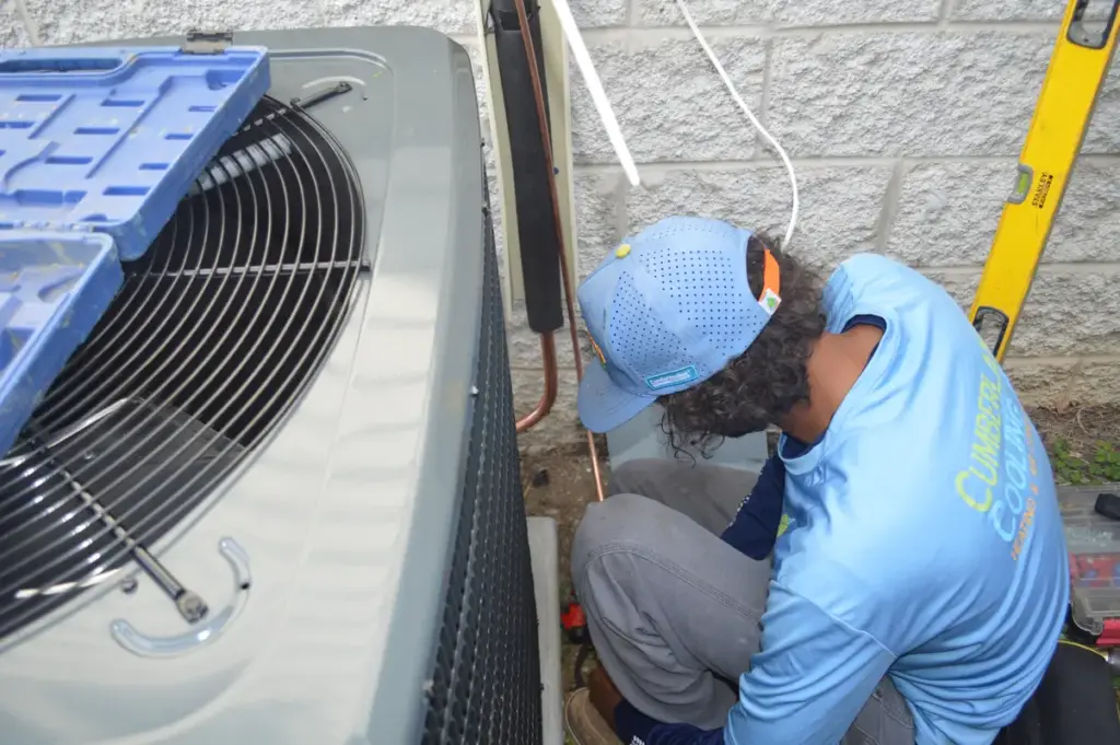 Technician installing new HVAC