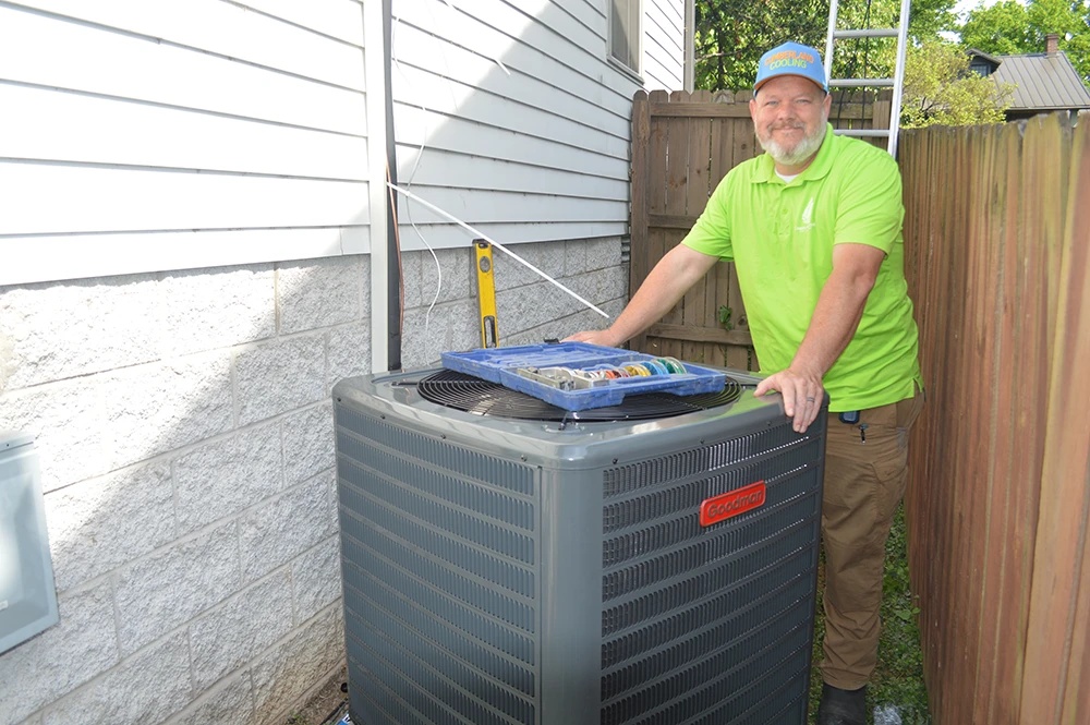 Cumberland Cooling owner John Mark installing new HVAC AC unit