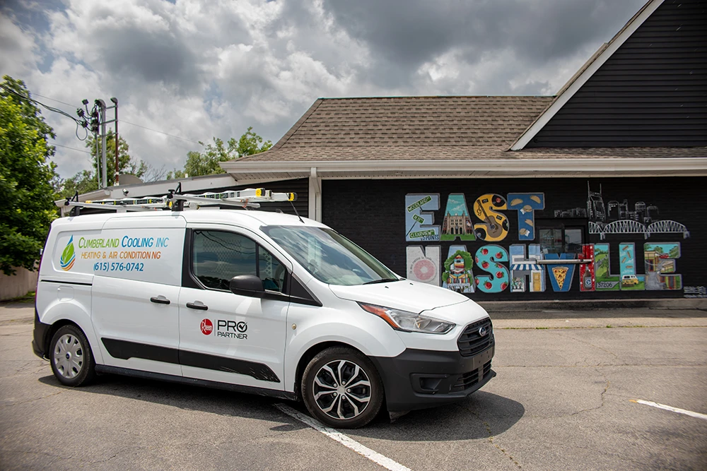 Cumberland Cooling van parked in front of East Nashville mural