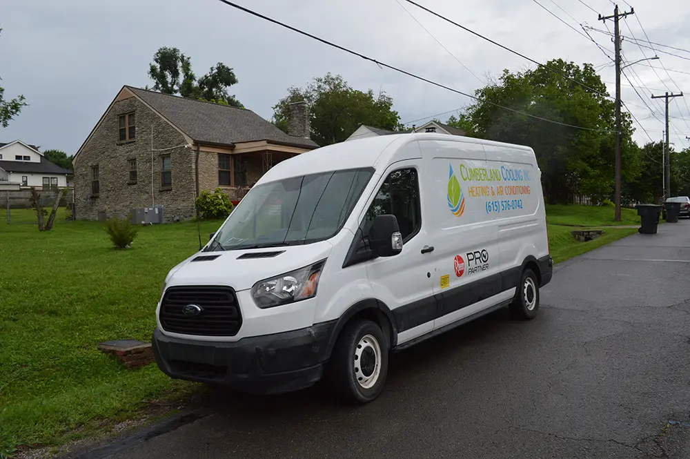 Cumberland Cooling van parked outside of home