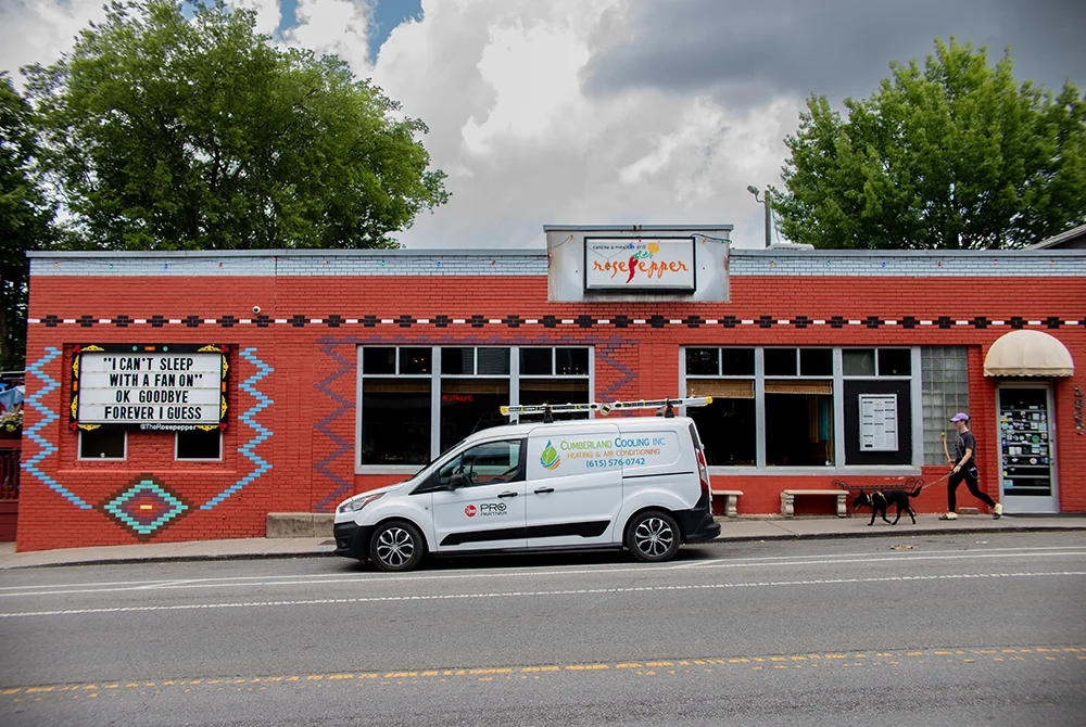 Cumberland Cooling van parked in front of Rose Pepper Mexican restaurant