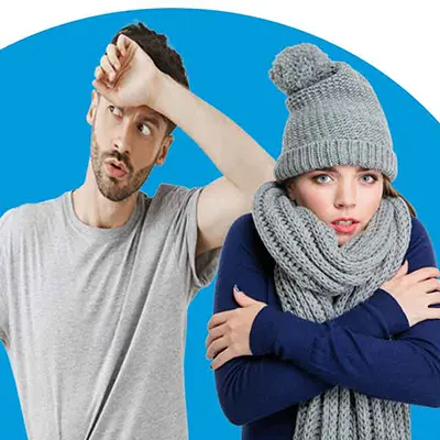 Woman cold in scarf with man hot in t-shirt